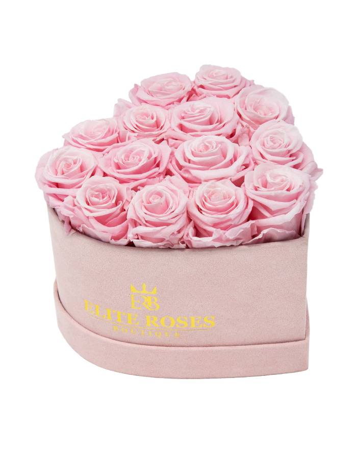 Pink roses in a small heart box